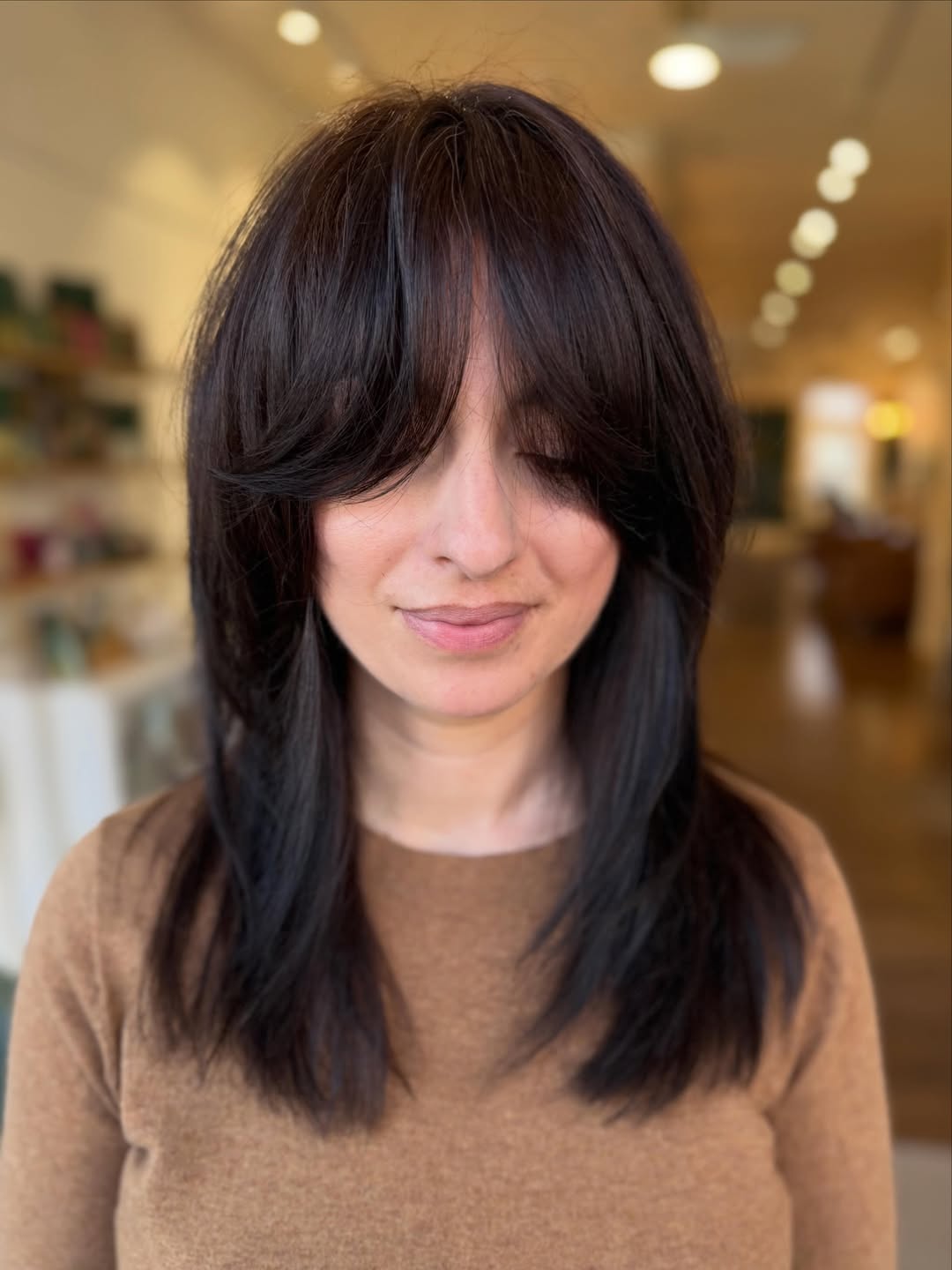 Choppy Medium Layers With Full Wispy Bangs