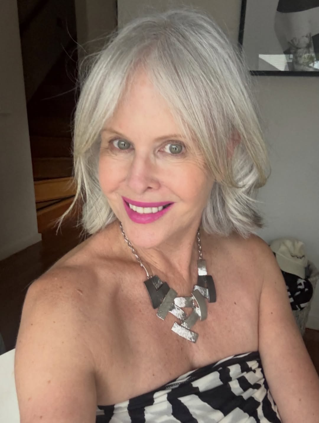 25 Stunning Hairstyles for Older Women in 2026 24 Choppy Silver Bob With Feathered Bangs
