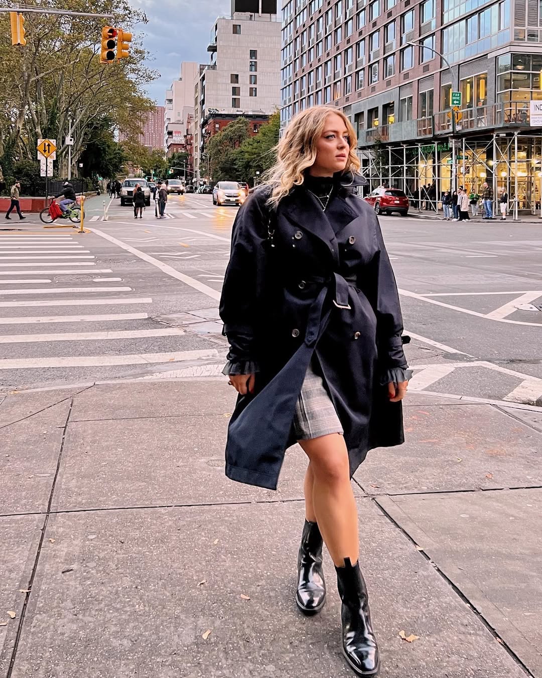 25 Early Fall Outfits You Need for 2026 16 Classic Trench With Plaid Mini Skirt and Boots