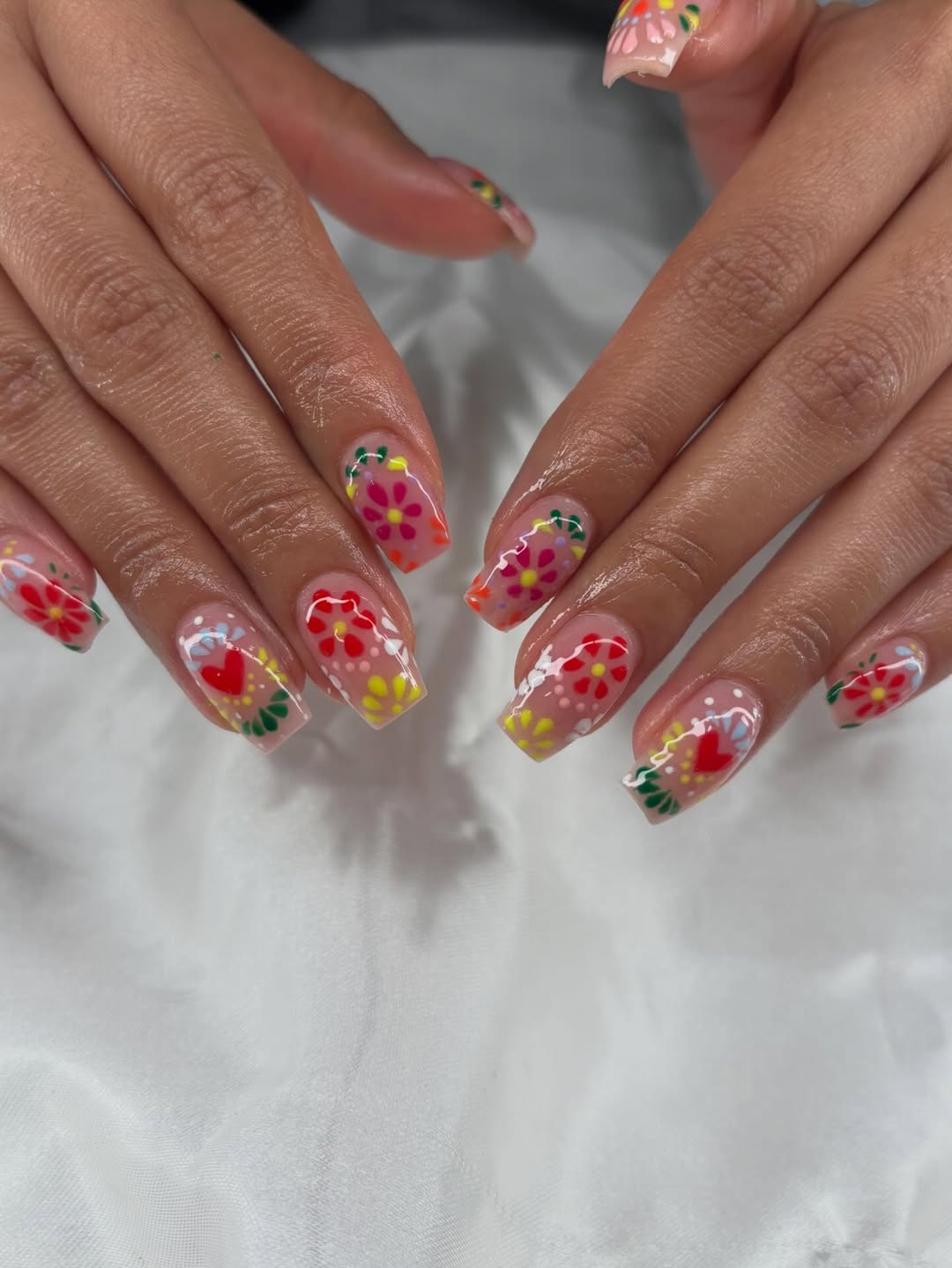 27 Stunning Mexican Nail Designs for 2026 16 Clear Base Folk Art Floral Glossy Square Nails