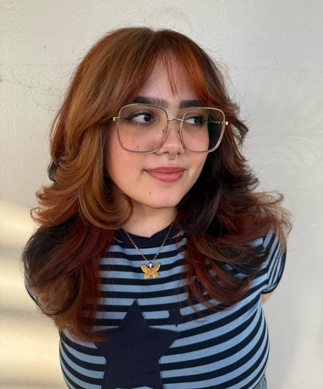 Coppery Brown Medium Layers With Curtain Bangs
