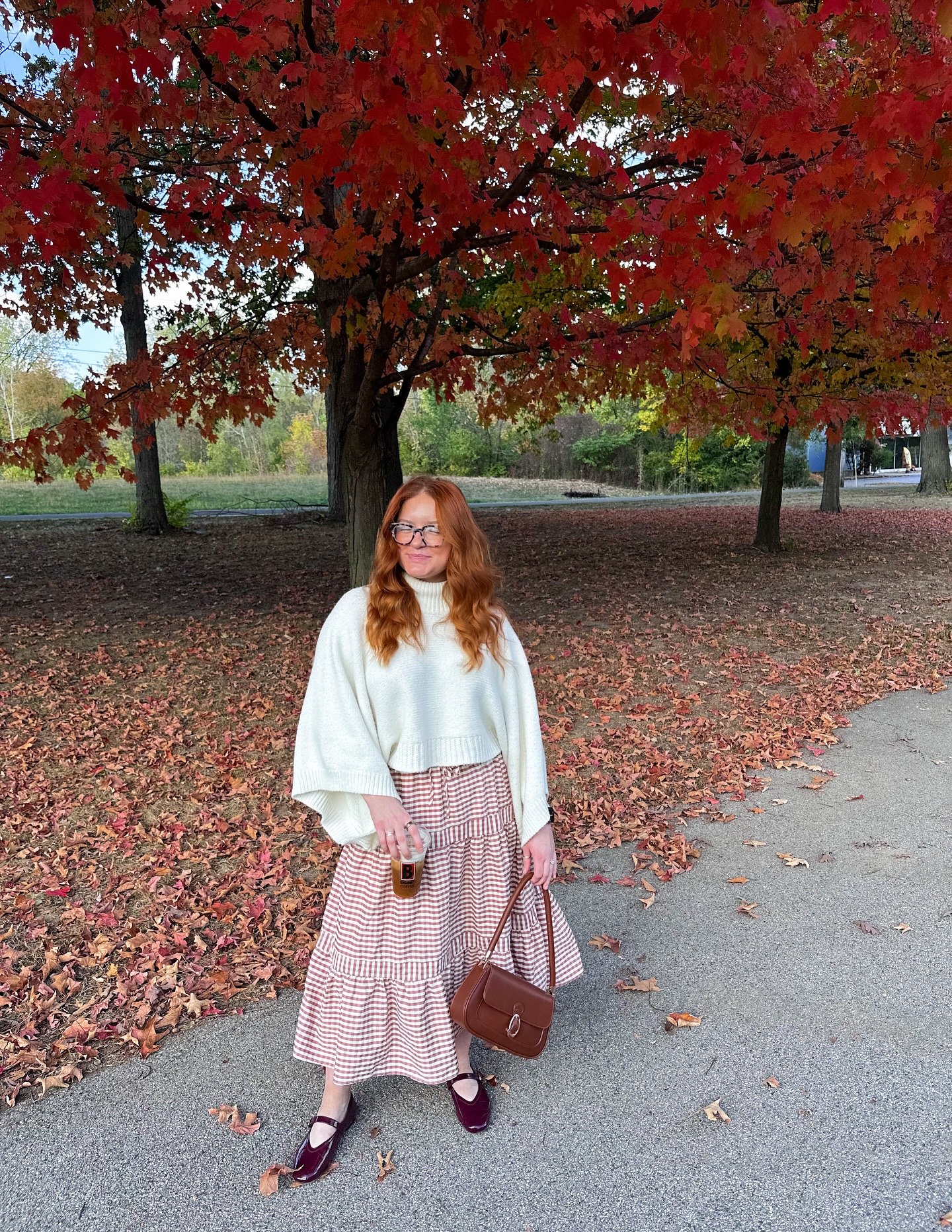 29 Chic Fall Skirt Outfits You Need for 2026 7 Cozy Knit And Gingham Midi Skirt Fall Look