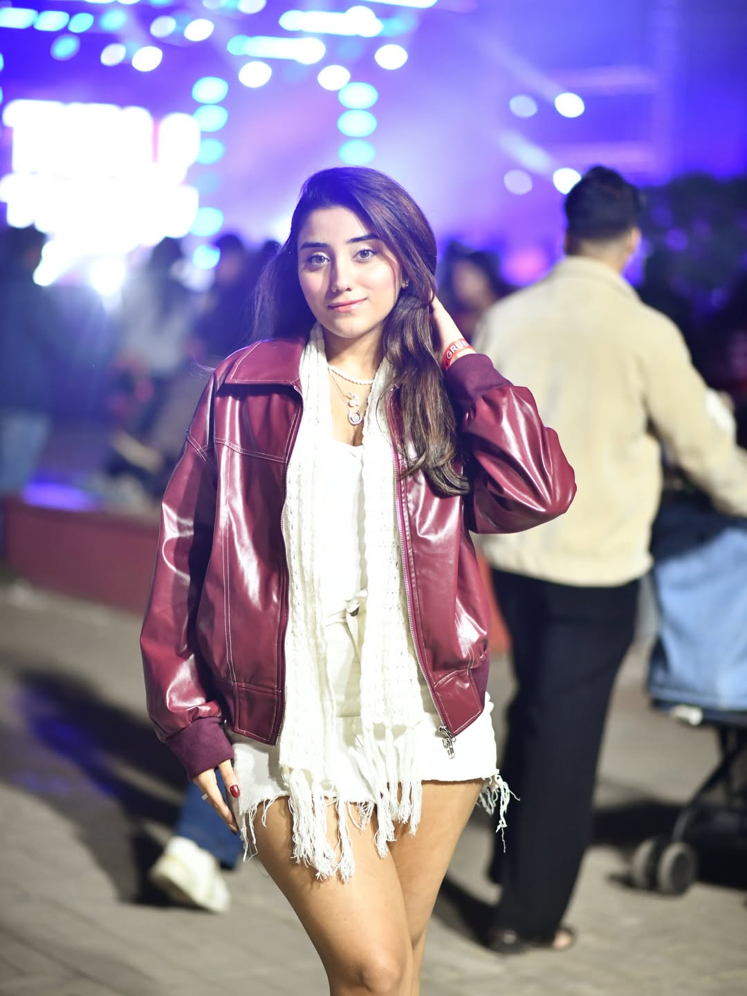 25 Concert Outfit Ideas You Need for 2026 11 Crimson Faux Leather Bomber With White Fringe Top