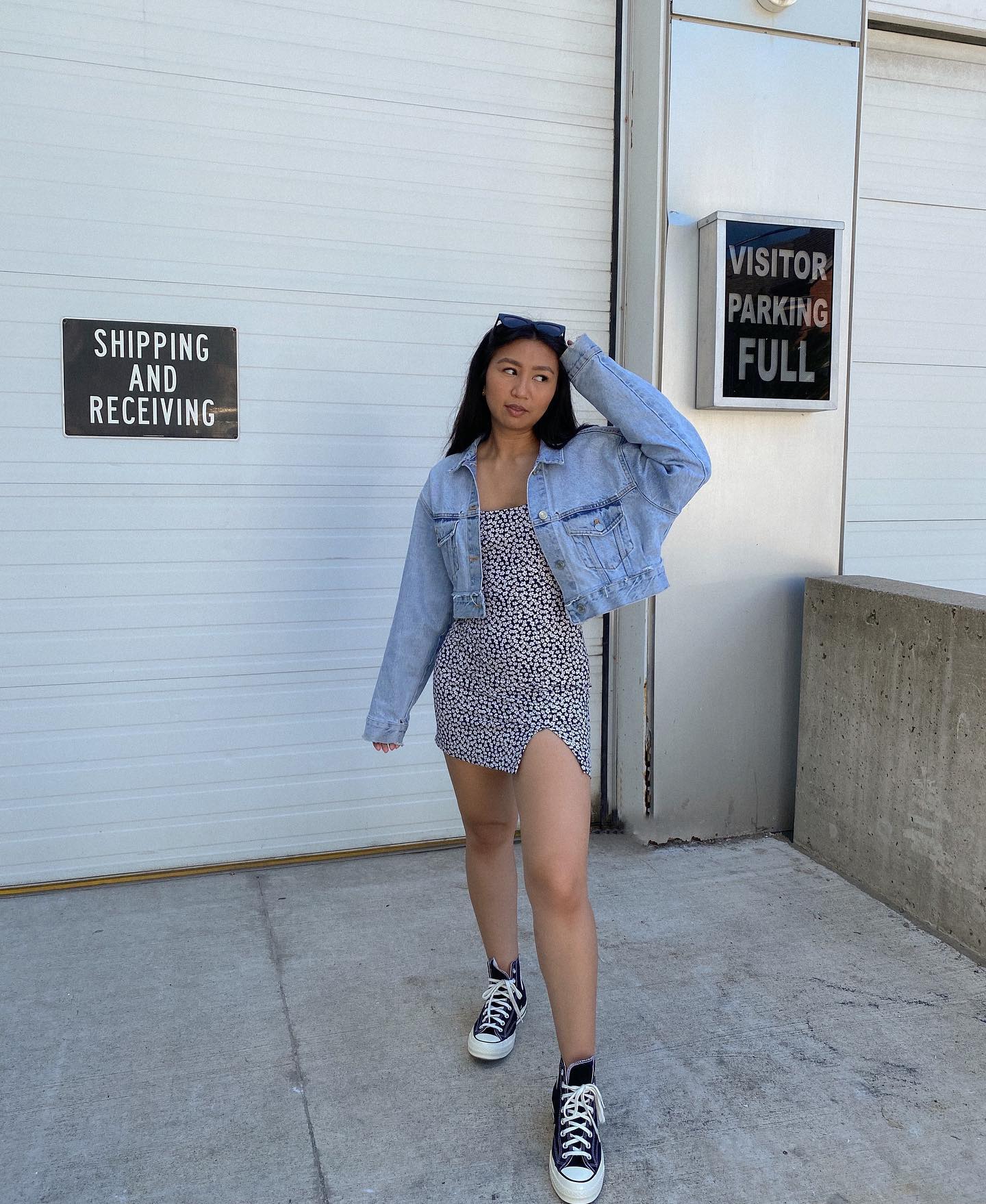 27 Jean Jacket Outfits You Need for 2026 6 Denim Jacket Over Ditsy Floral Mini Dress