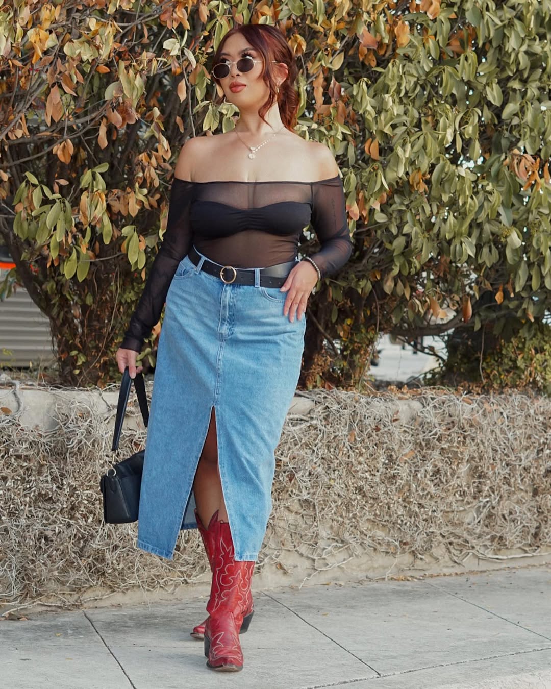 25 Cowboy Boot Outfits You Need for 2026 22 Denim Midi Skirt With Sheer Top And Cowboy Boots