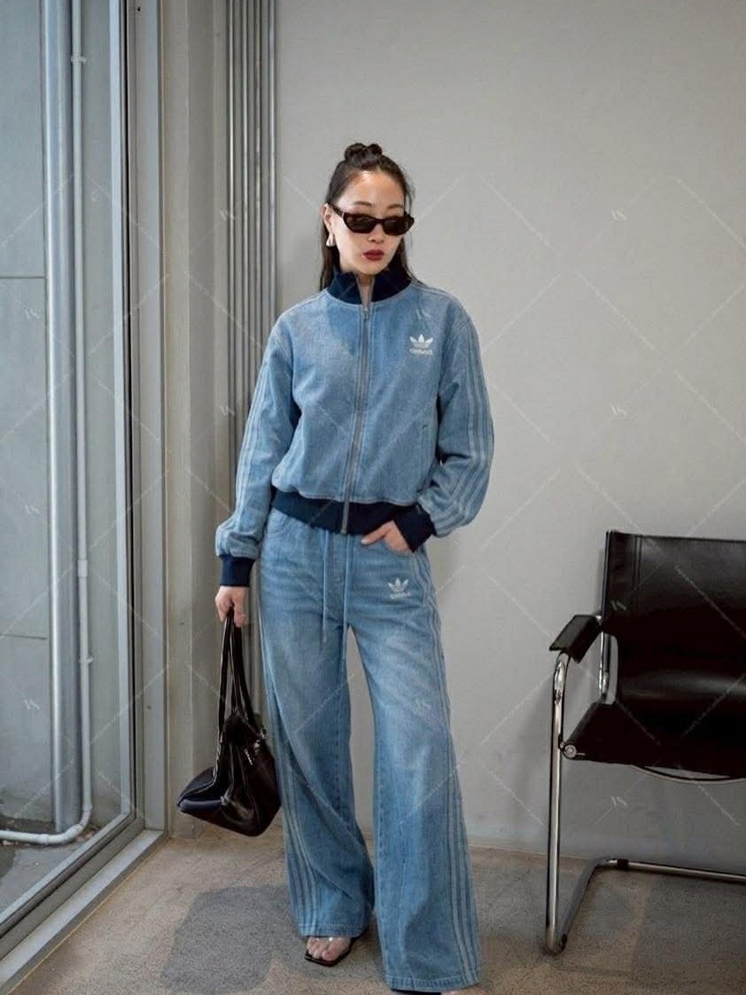 25 Denim on Denim Looks You Need for 2026 20 Denim Tracksuit With Cat-Eye Sunglasses