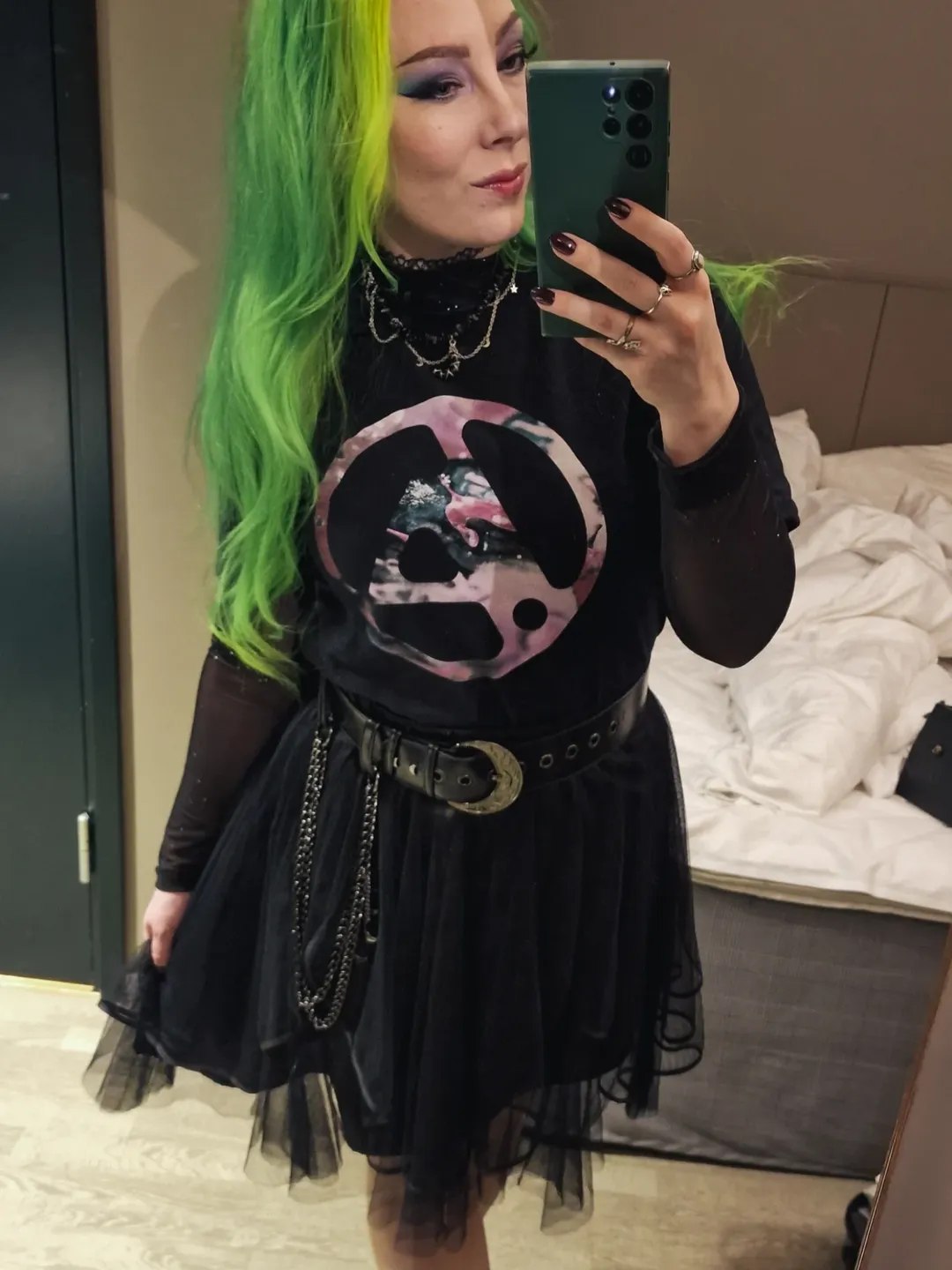 25 Concert Outfit Ideas You Need for 2026 6 Edgy Black Tulle Skirt With Band Tee Look