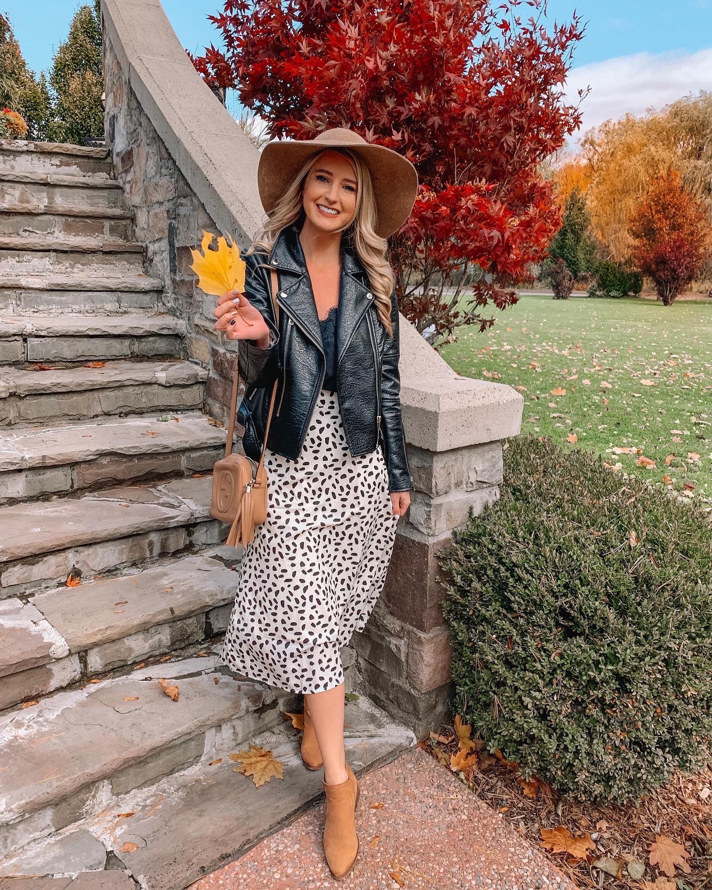 29 Chic Fall Skirt Outfits You Need for 2026 15 Edgy Moto Jacket With Leopard Midi Skirt