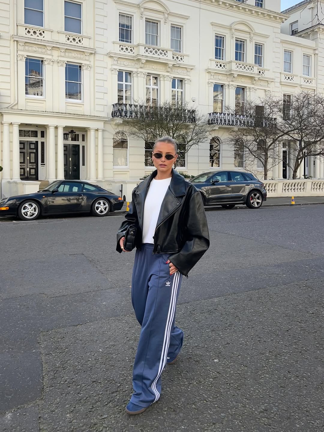 Effortless Cool Navy Track Pants With Leather Jacket