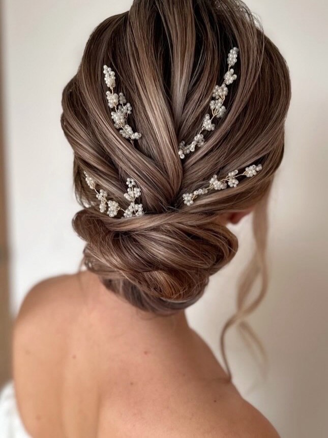 Elegant Braided Updo With Pearl Sprigs