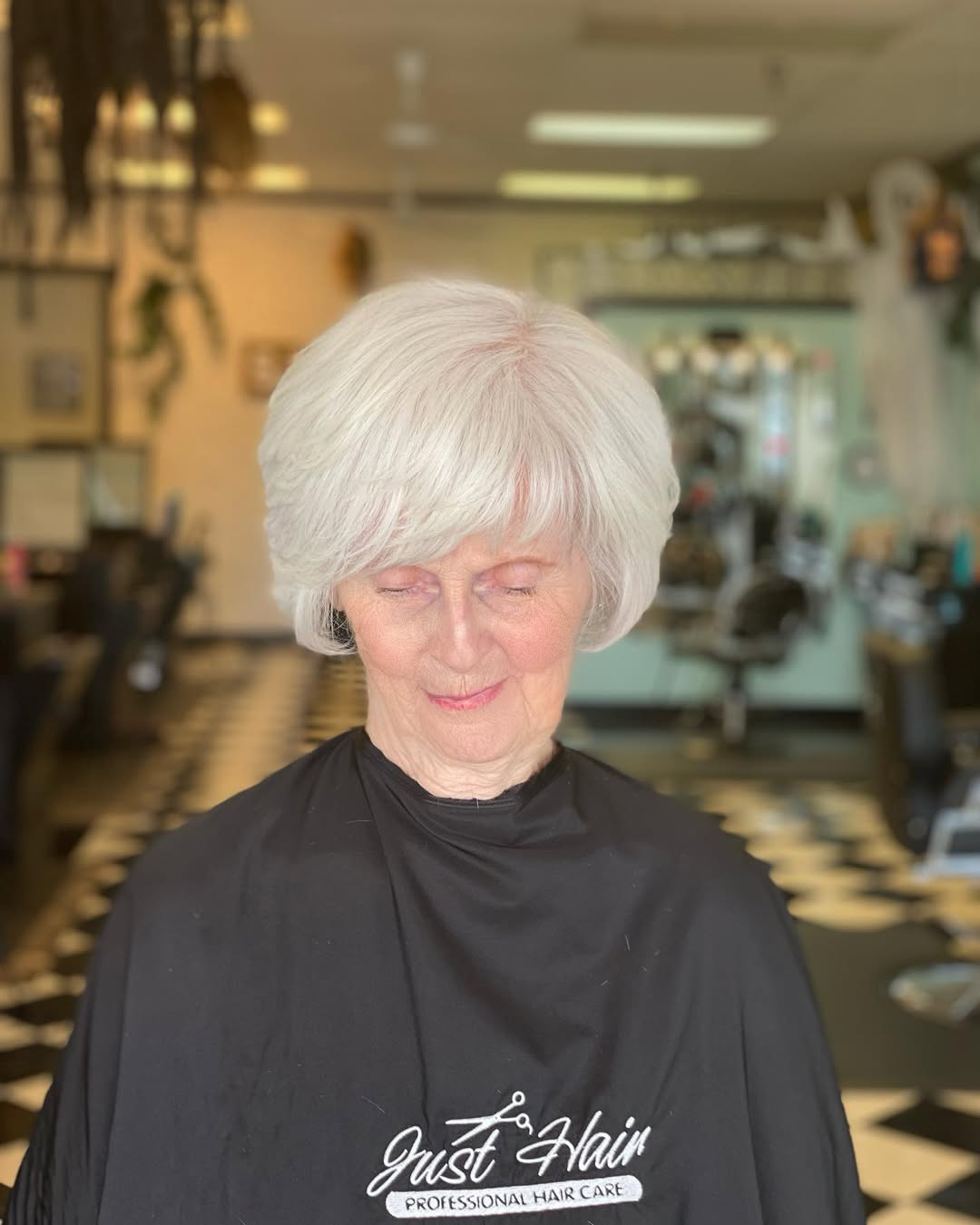 25 Stunning Hairstyles for Older Women in 2026 9 Elegant Silver Fox Feathered Pixie Cut