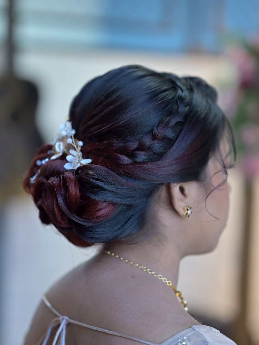 Exquisite Braided Updo With Floral Hairpiece Accent