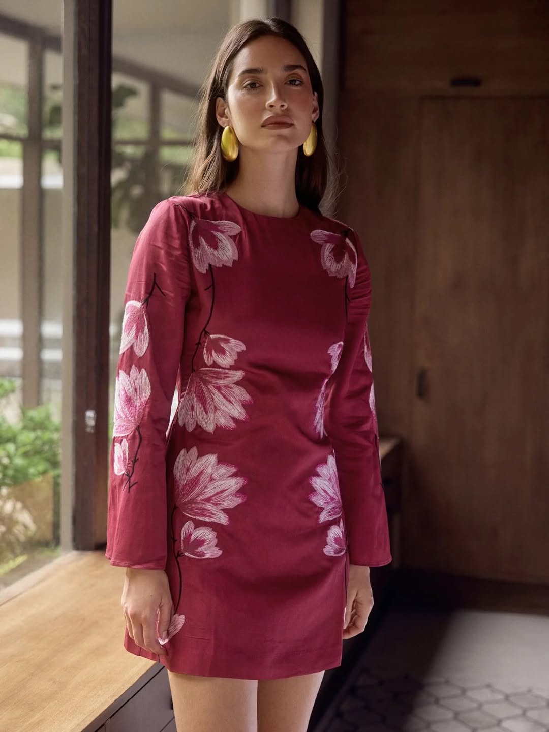 25 Dress with Tights Trends You Must See for 2026 22 Floral Print Mini Dress With Bold Statement Earrings