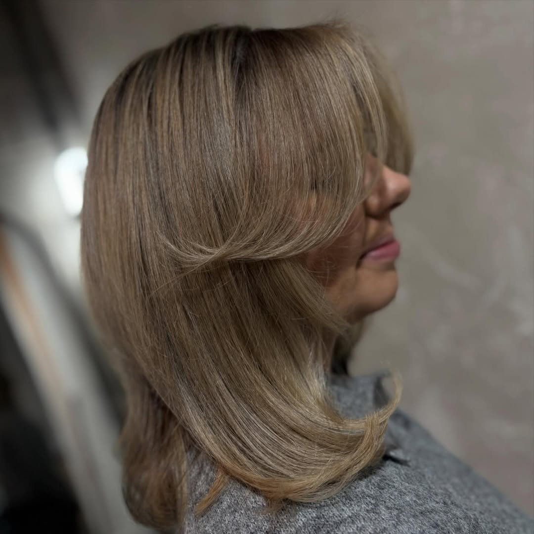 Fluffy Medium Layers With Full Face-Framing Bangs