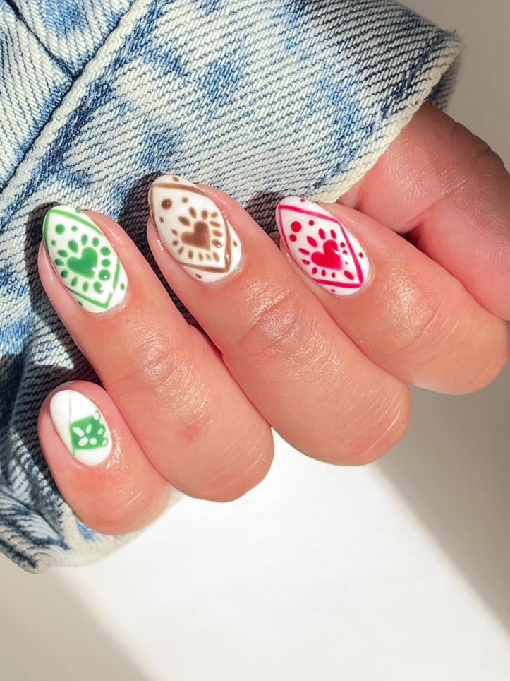 27 Stunning Mexican Nail Designs for 2026 8 Folksy White Almond Nails With Colorful Hand-Painted Hearts
