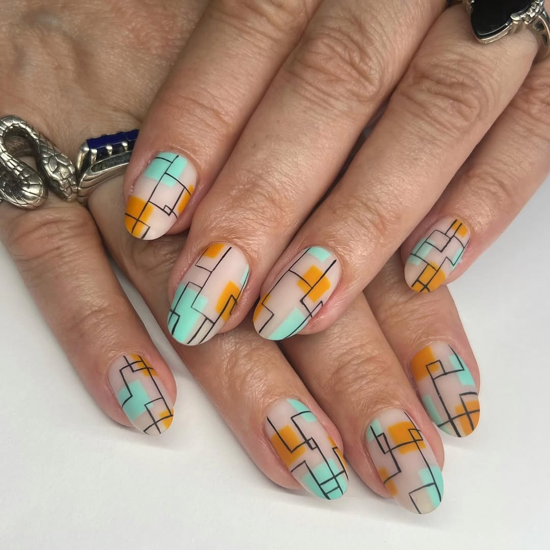 Geometric Grid Matte Almond Nails with Pastel Blocks
