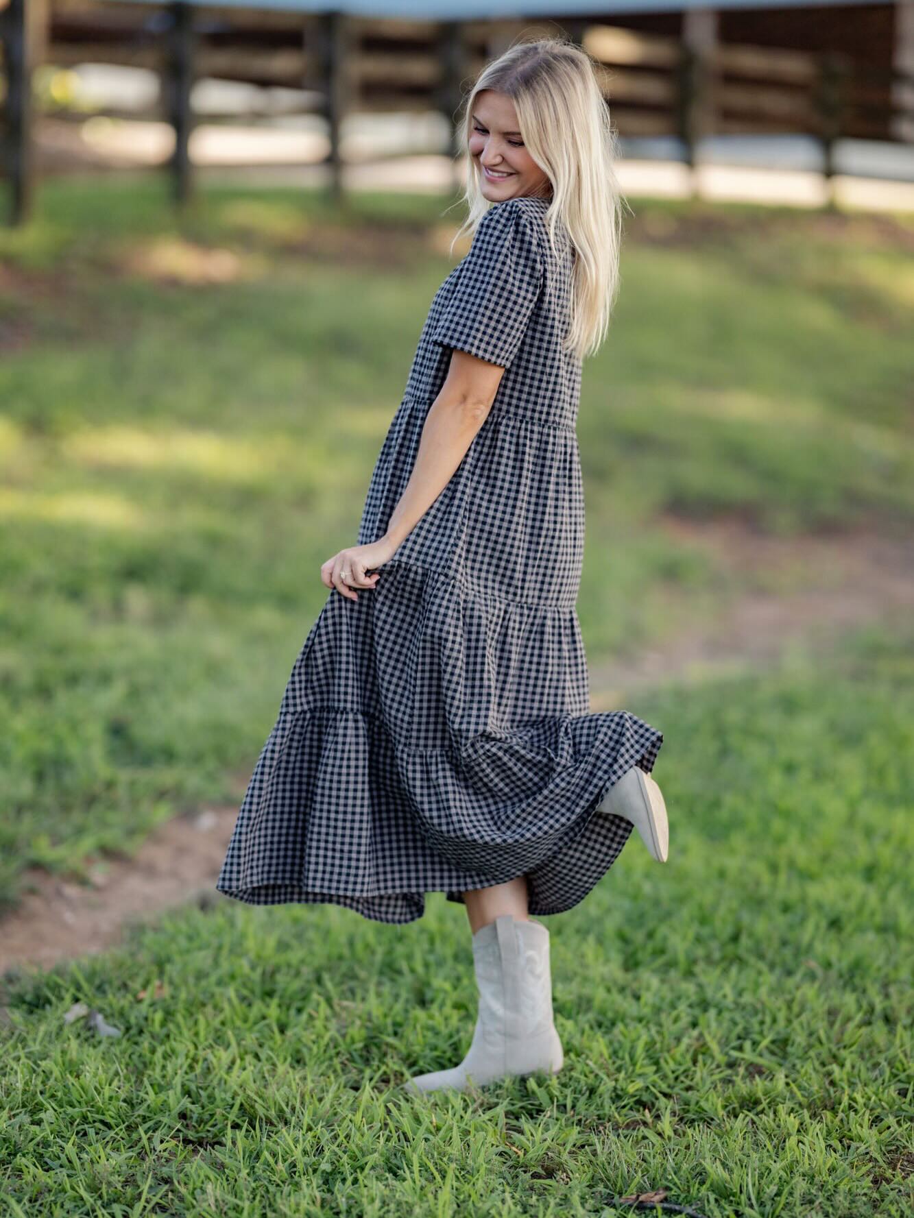 25 Fall Dress Outfits You Need For 2026 23 Gingham Tiered Midi Dress With Western Boots Style
