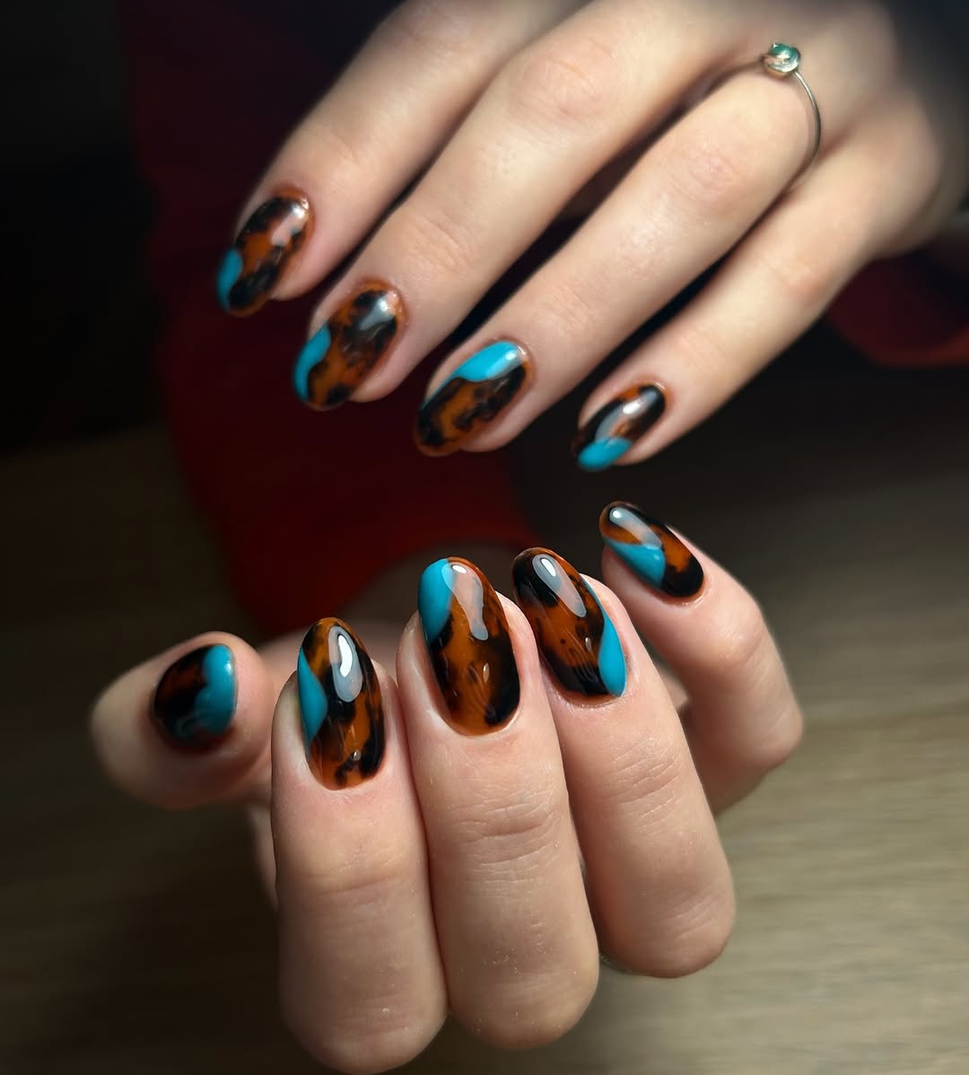 27 Tortoise Nail Trends You Need for 2026 6 Glossy Almond Tortoise Shell Teal Negative Space