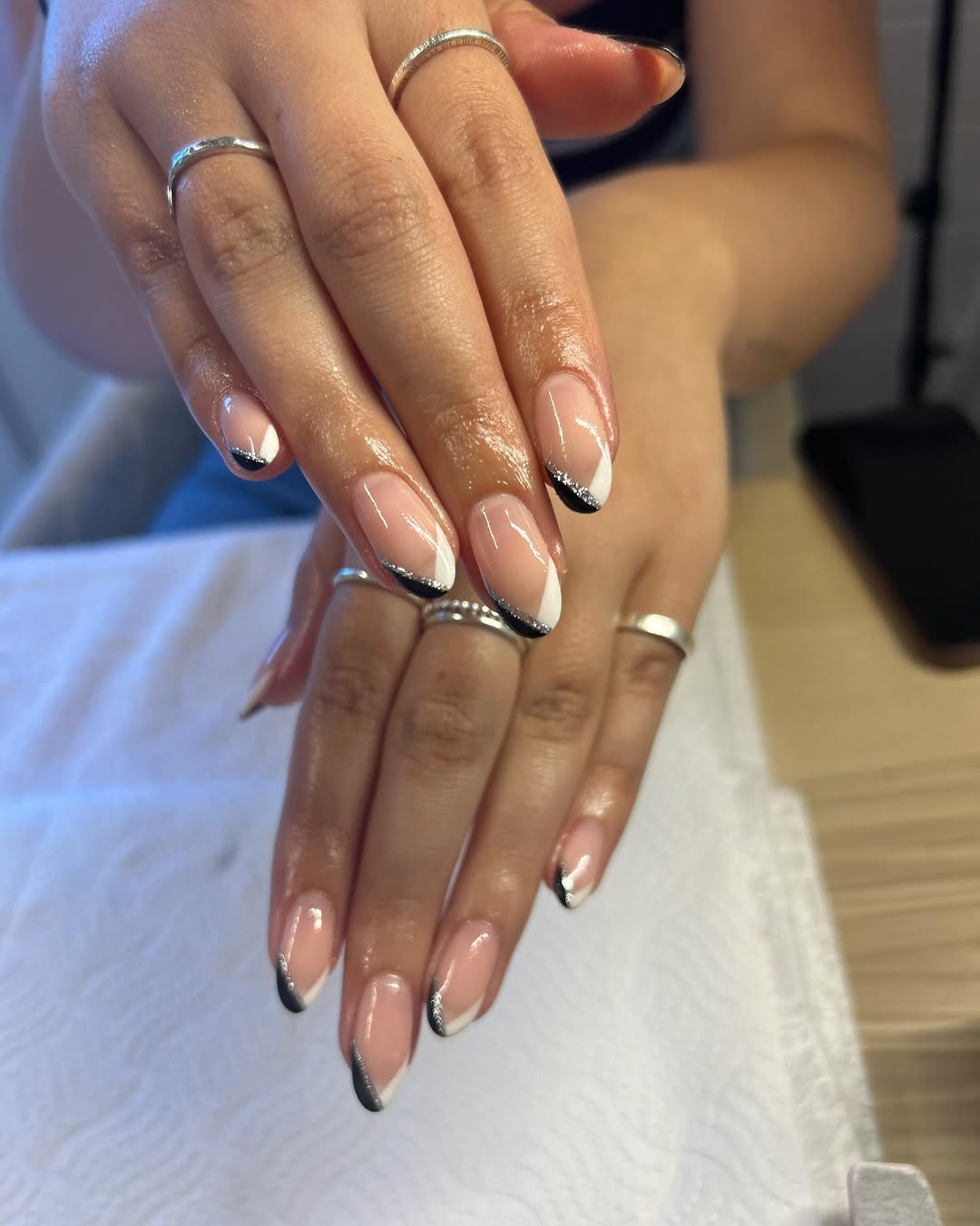 Glossy Black and Silver V-Tip Reverse French