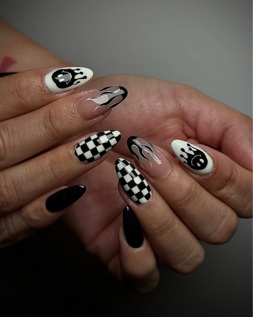 29 Checkerboard Nail Ideas for 2026 5 Glossy Black Checkerboard Fire And Drip Art Nails