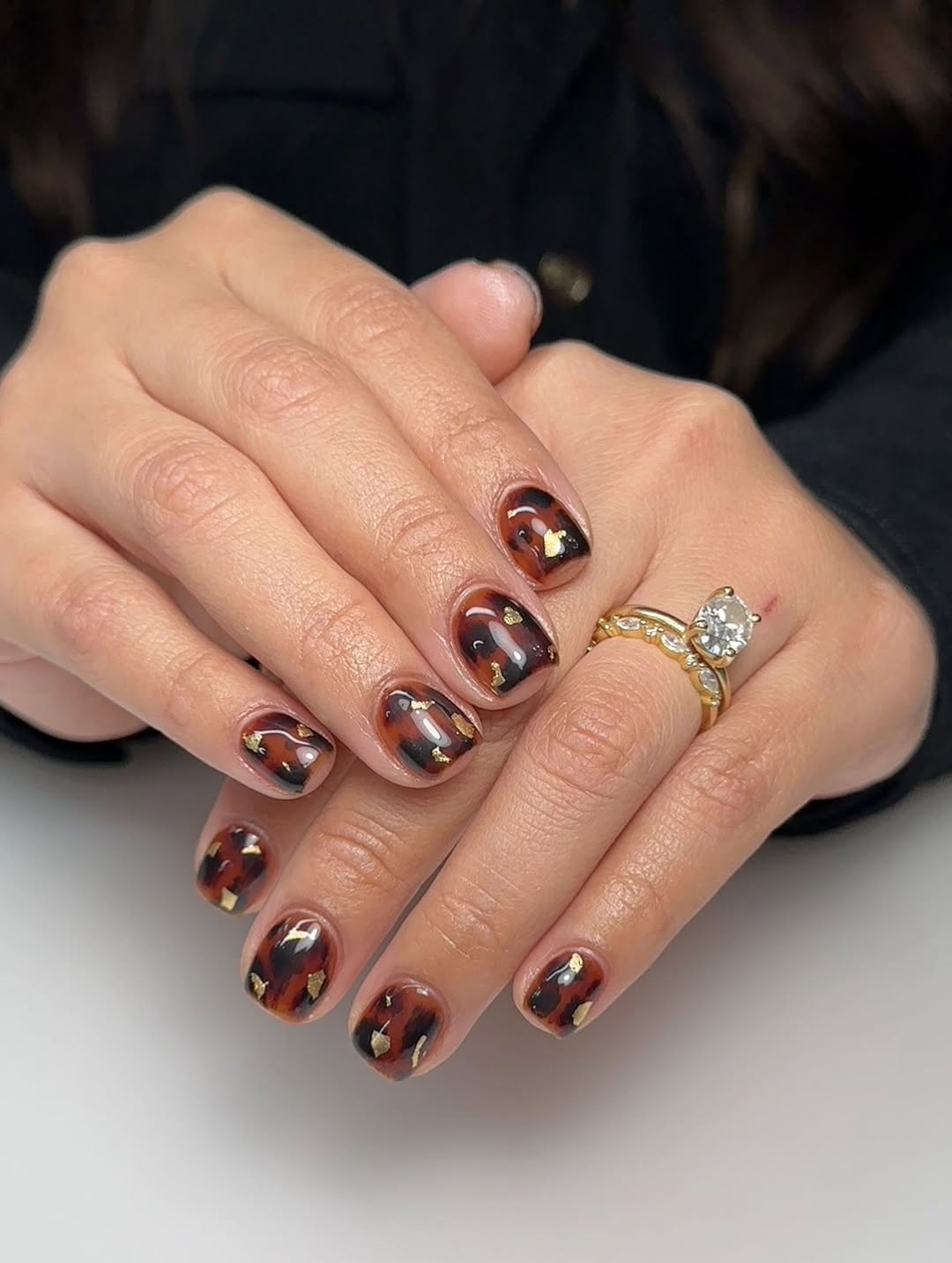 27 Tortoise Nail Trends You Need for 2026 28 Glossy Gold Flake Tortoise Shell Short Rounded Nails