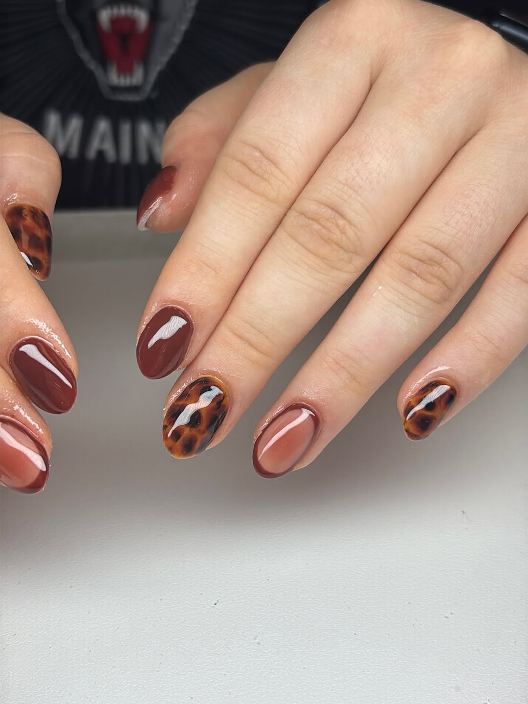 27 Tortoise Nail Trends You Need for 2026 13 Glossy Tortoiseshell Accent Swirl Coffin Nails