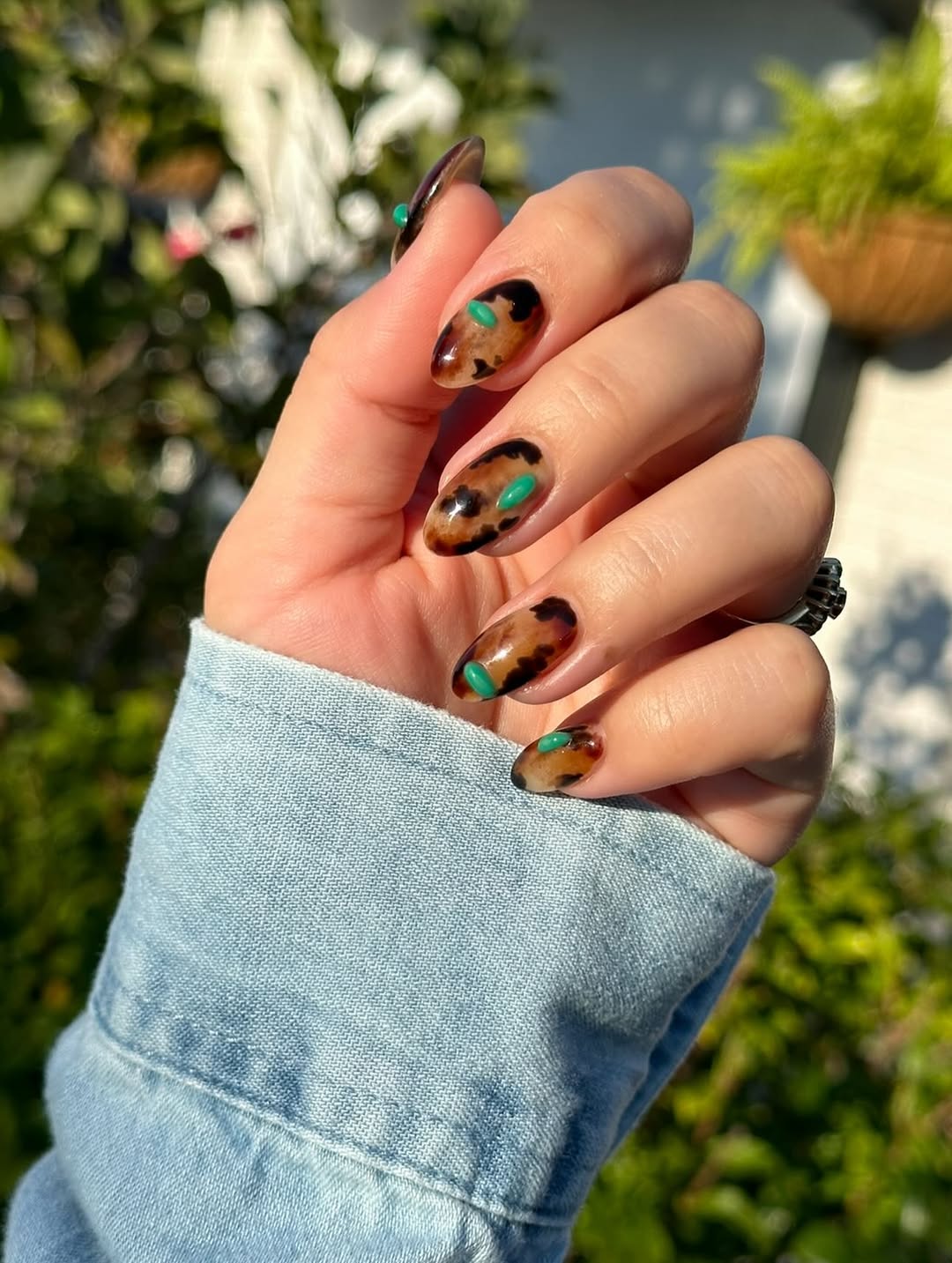 27 Tortoise Nail Trends You Need for 2026 17 Glossy Tortoiseshell Oval Nails with Green Accent