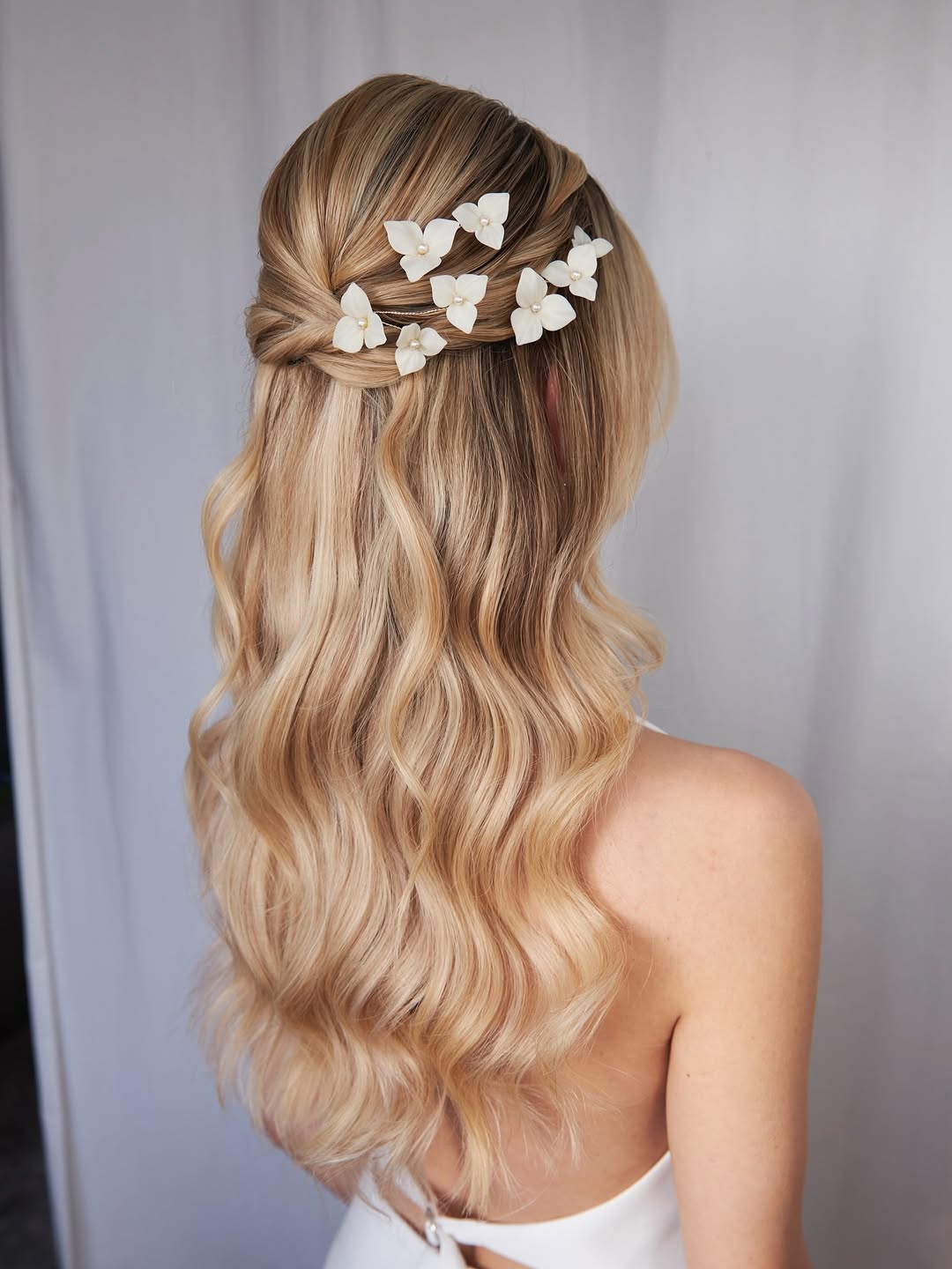 Half Up Bridal Waves With Delicate Floral Accents