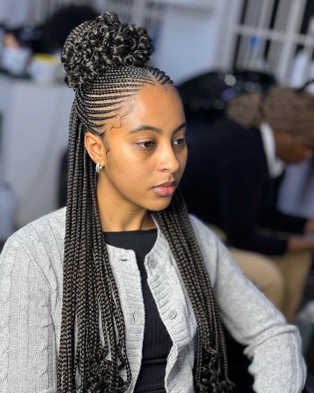 Half-Up Curly Bun Braids With Sleek Edges