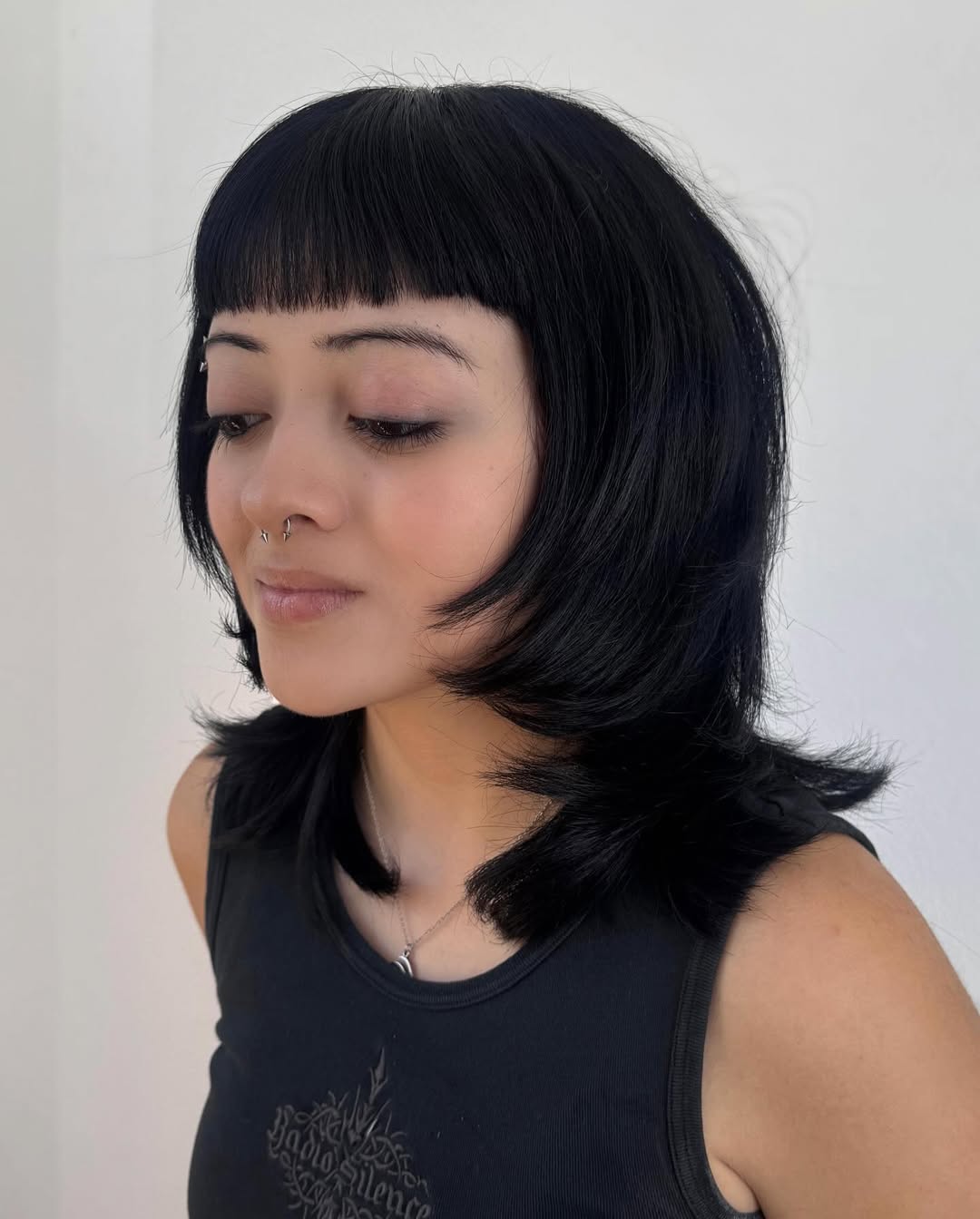 Jet Black Wolf Cut With Blunt Micro Bangs