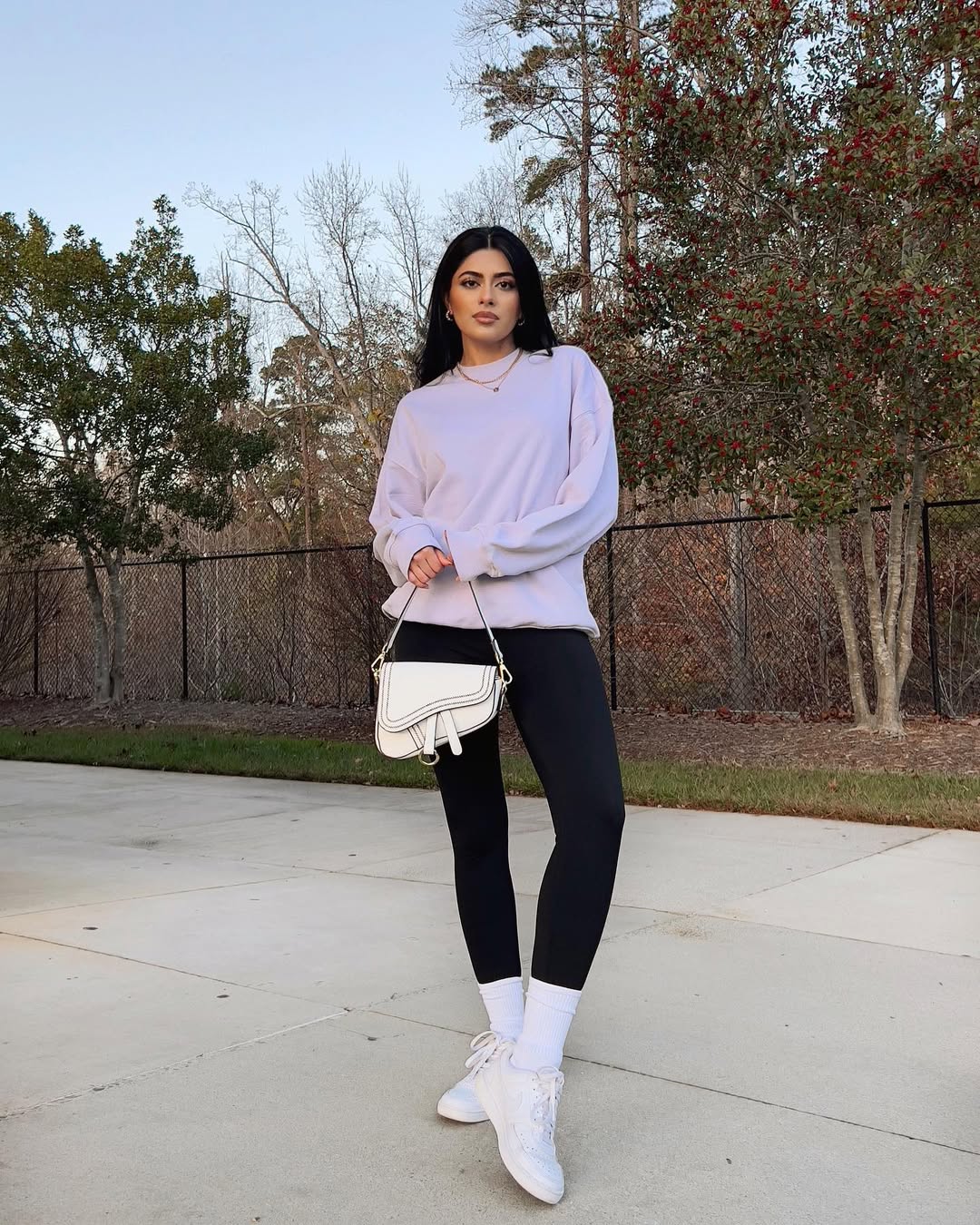 25 Early Fall Outfits You Need for 2026 10 Lavender Sweatshirt And Black Legging Athleisure