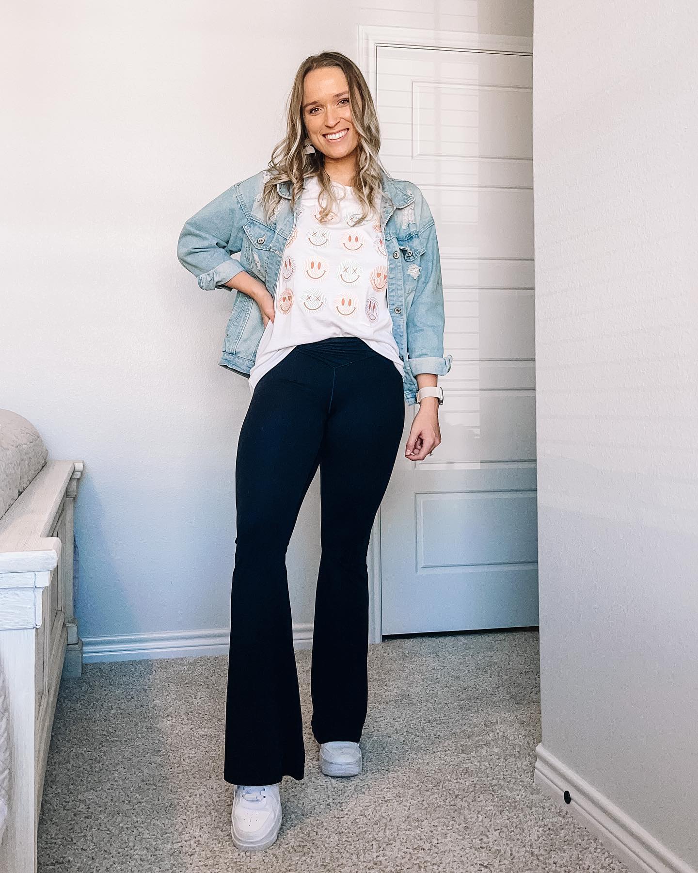 27 Jean Jacket Outfits You Need for 2026 19 Light Wash Denim Jacket With Smiley Tee