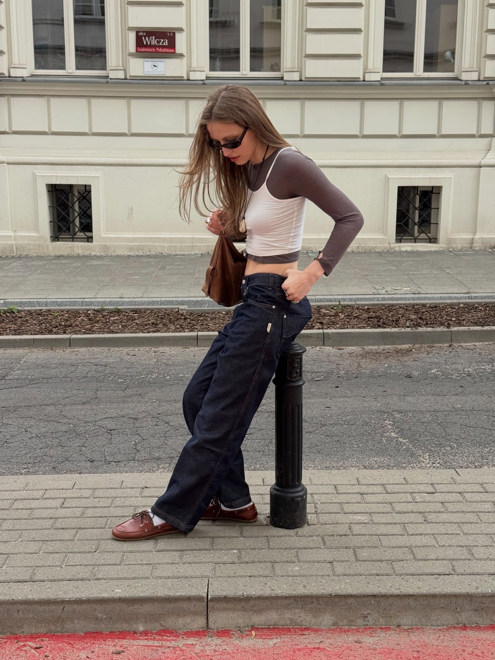 25 Fall Going Out Outfits You Need for 2026 13 Long Sleeve Under Crop Top And Dark Wash Denim