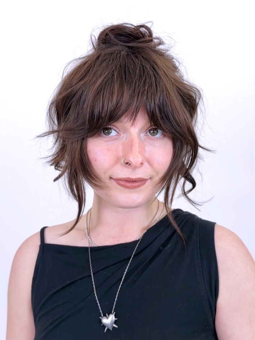 Messy Half-Up Bun With Shaggy Face-Framing Bangs