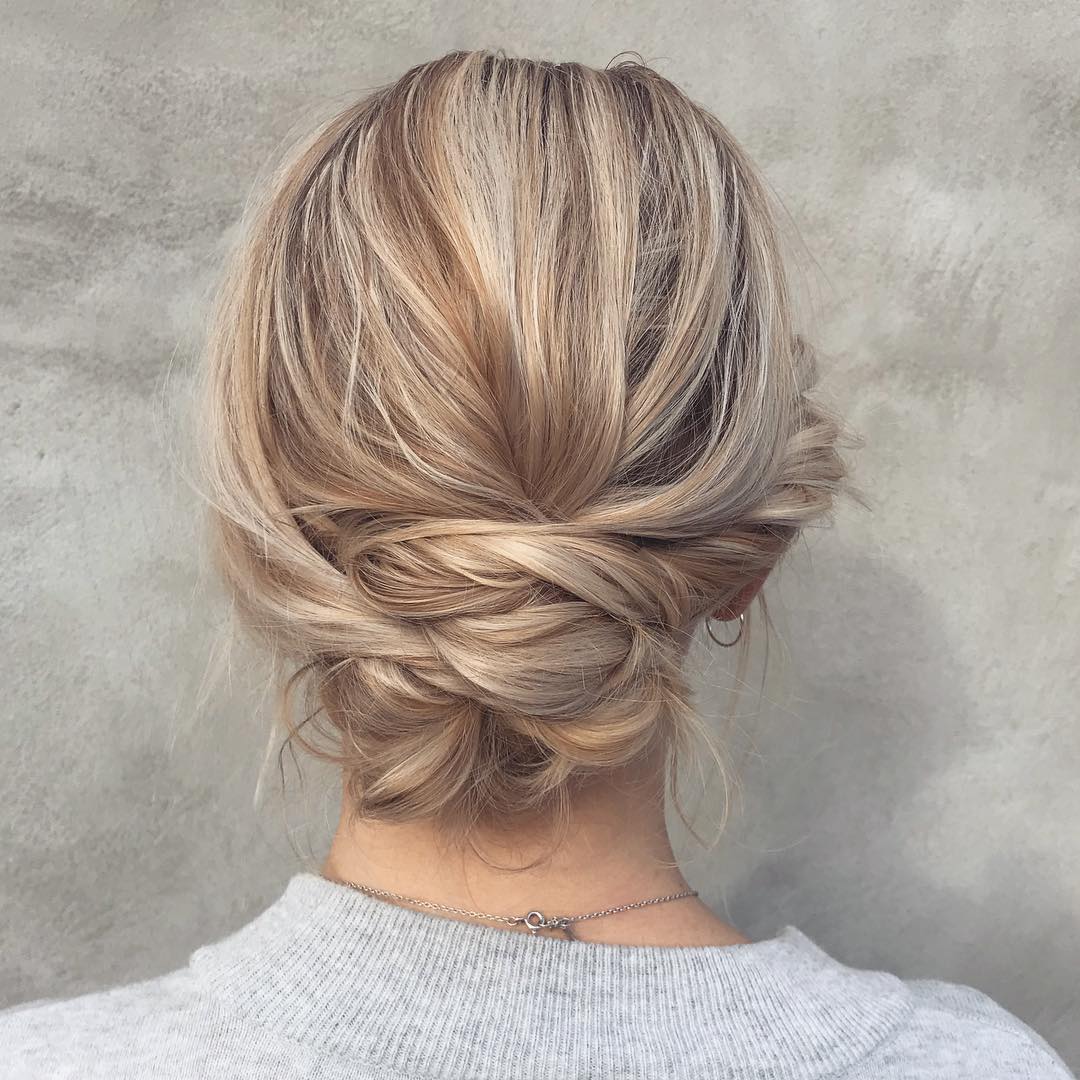 Messy Low Updo With Blonde Highlights And Dimension