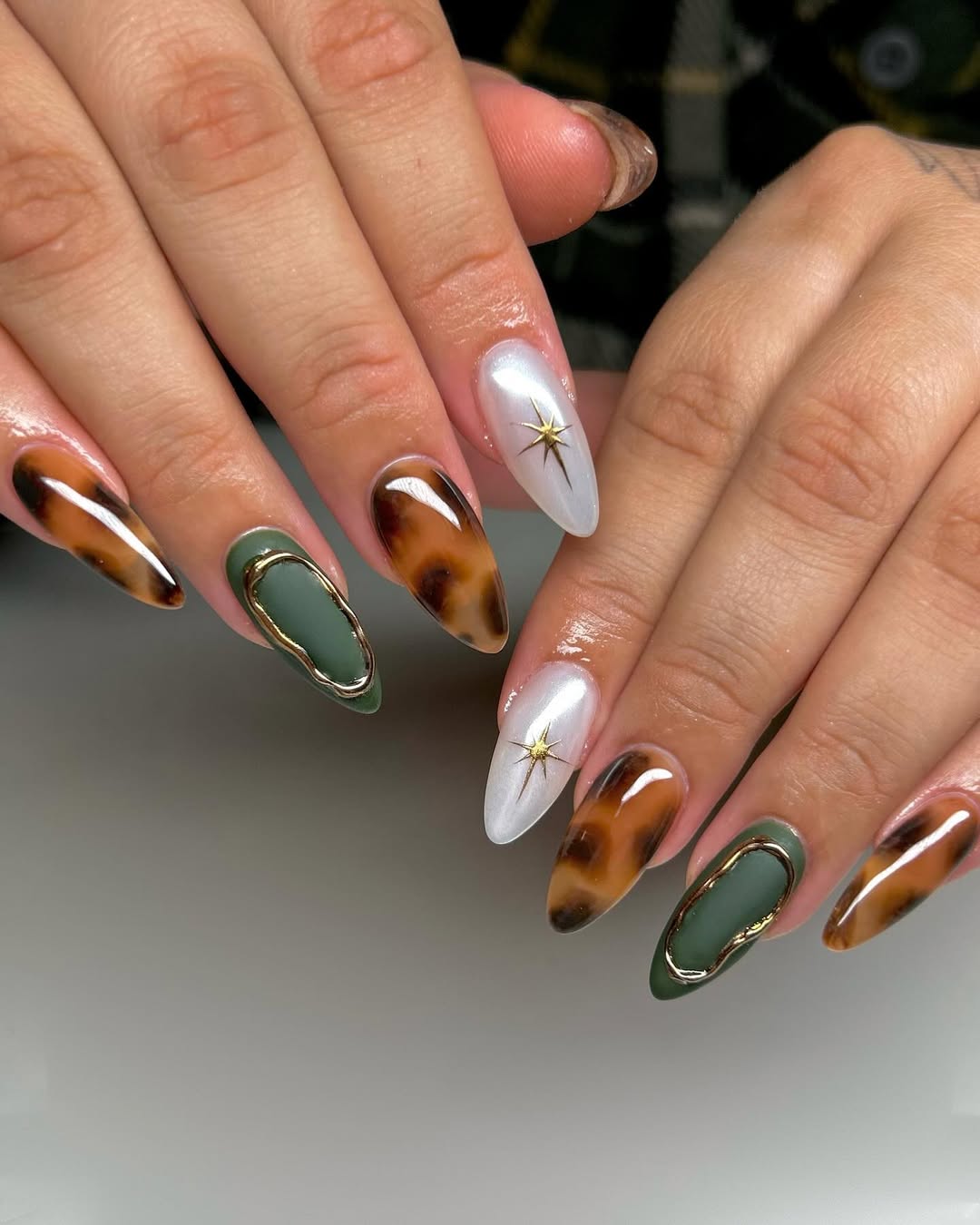 27 Tortoise Nail Trends You Need for 2026 7 Mixed Tortoise Shell Green White Stiletto Nails