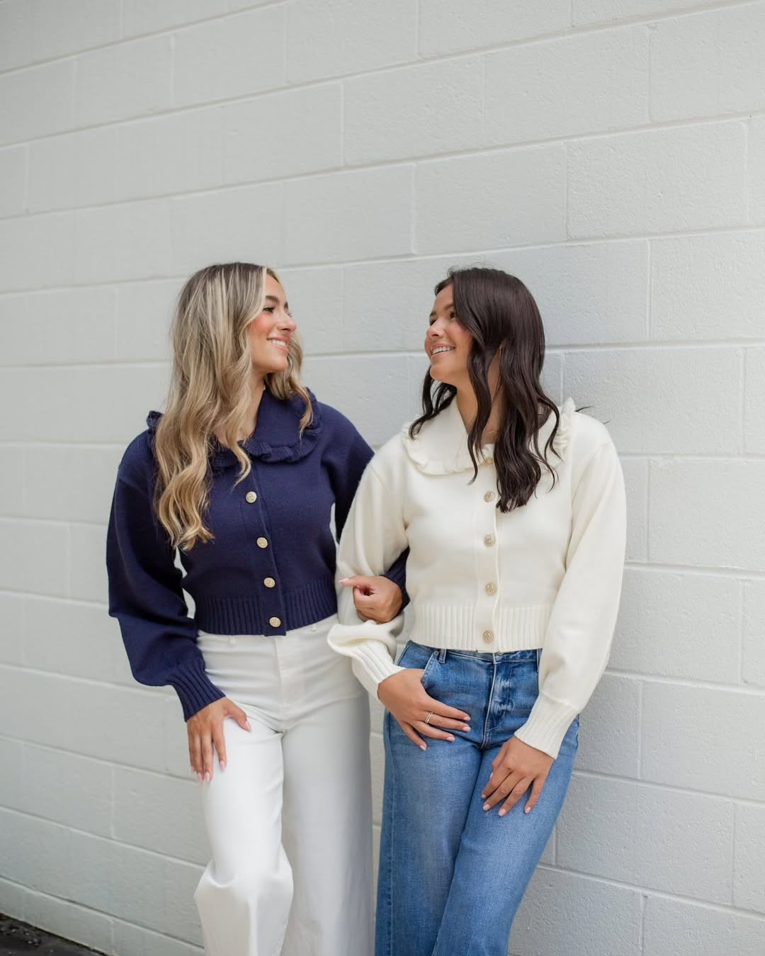 25 Fall Transition Outfits You Need for 2026 25 Navy Ruffle Collar Cardigan With White Wide Leg Pants