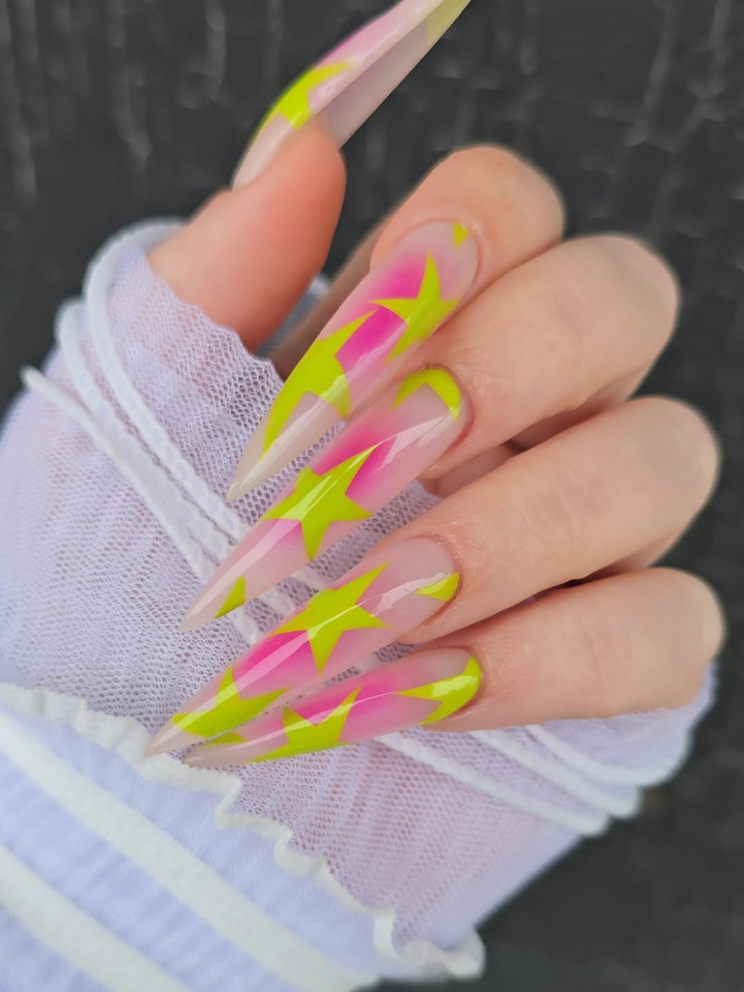 Neon Pink and Lime Starburst Stiletto Nails