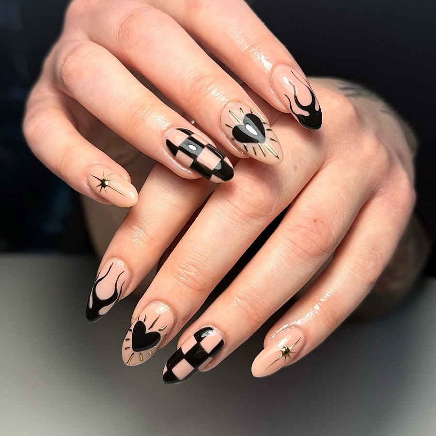 29 Checkerboard Nail Ideas for 2026 4 Nude Checkerboard Black Heart Flame Gold Spike Almond Nails