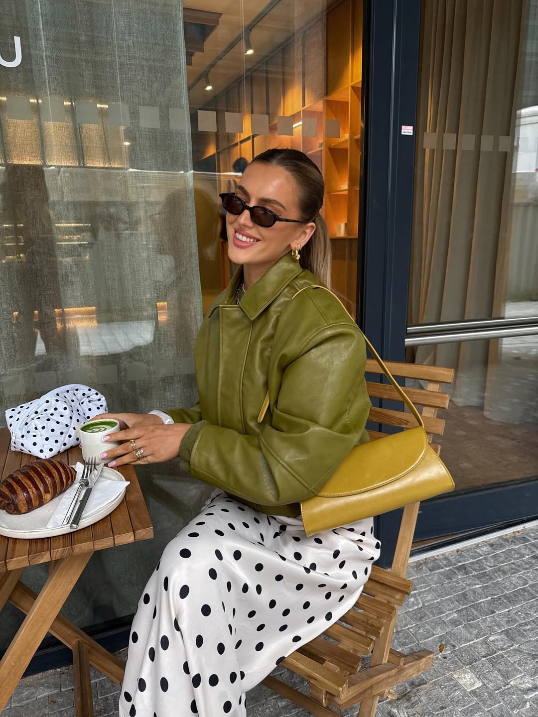 25 Fall Going Out Outfits You Need for 2026 4 Olive Faux Leather Jacket Polka Dot Midi Skirt