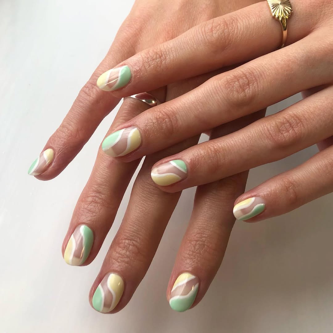 Pastel Swirl Negative Space Oval Nails