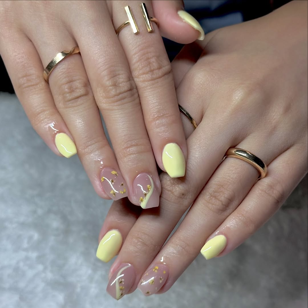 Pastel Yellow and Gold Flake Wavy French Accent Nails