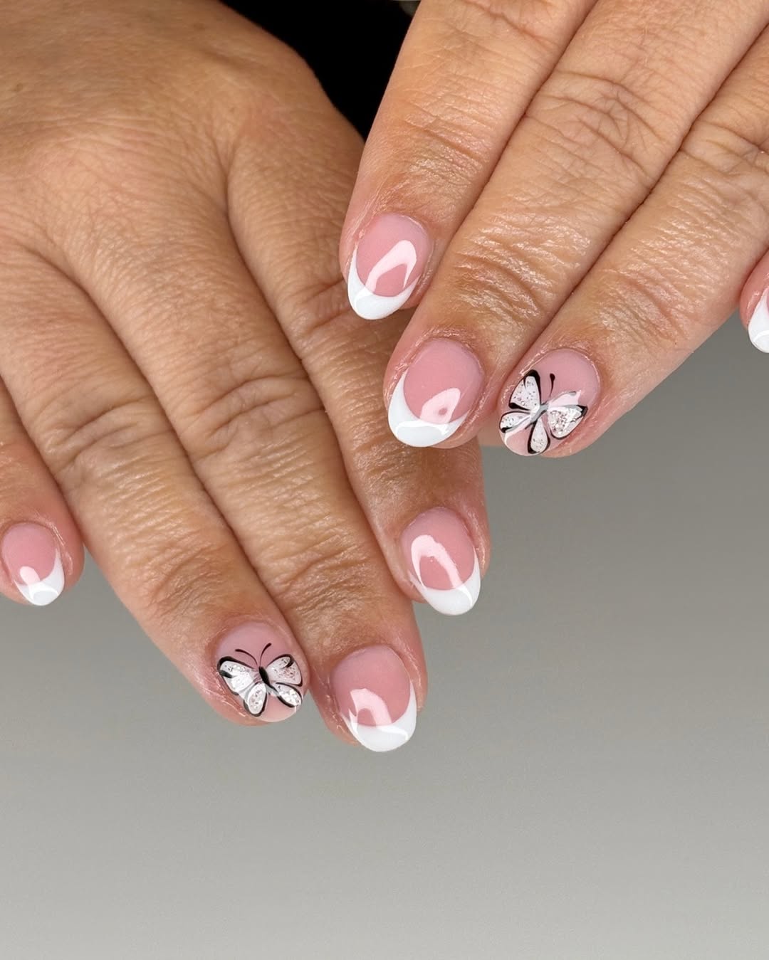 Pink French Tips With Black And White Butterflies