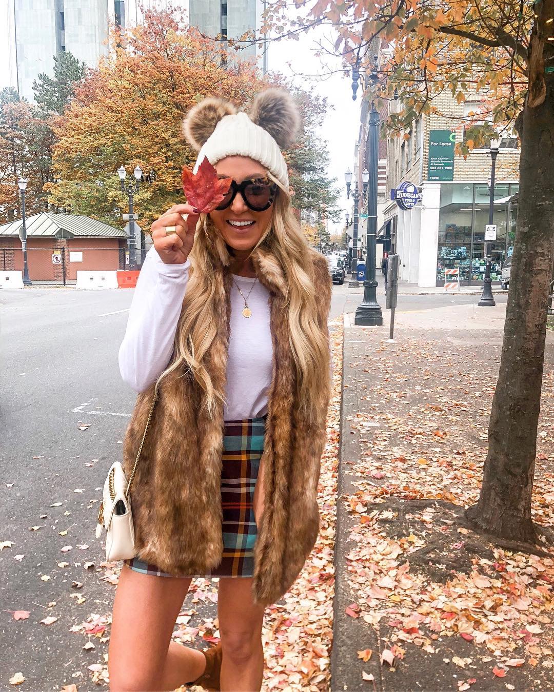 29 Chic Fall Skirt Outfits You Need for 2026 10 Plaid Mini Skirt With Faux Fur Vest Fall Look