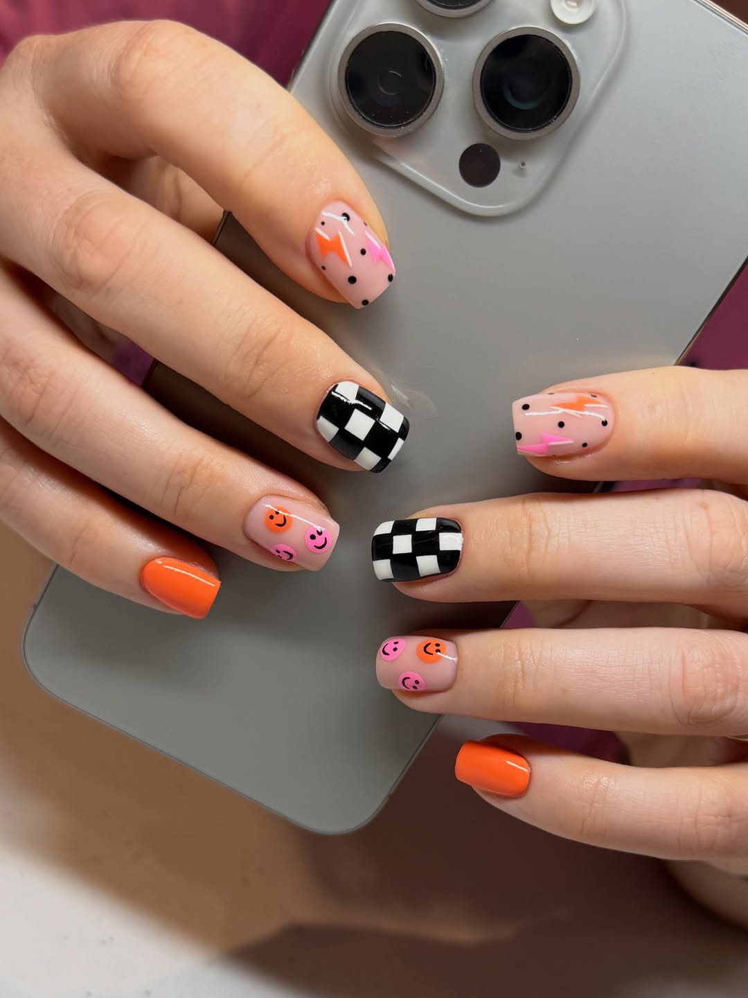 29 Checkerboard Nail Ideas for 2026 6 Playful Checkerboard Smiley Face Abstract Squoval Nails