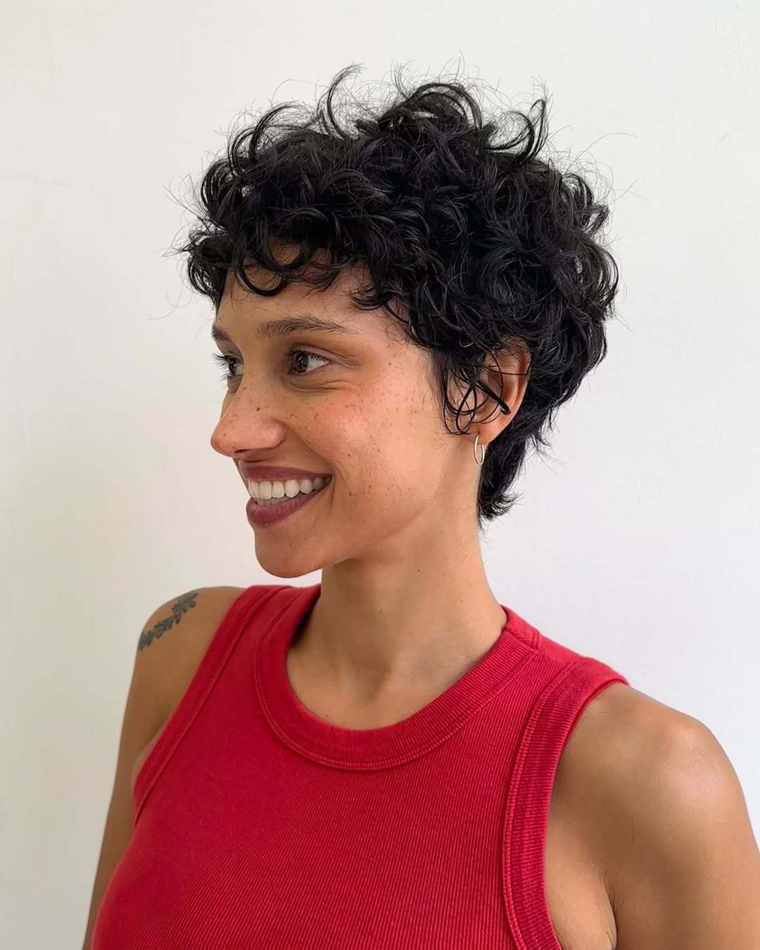 Playful Curly Pixie With Undercut