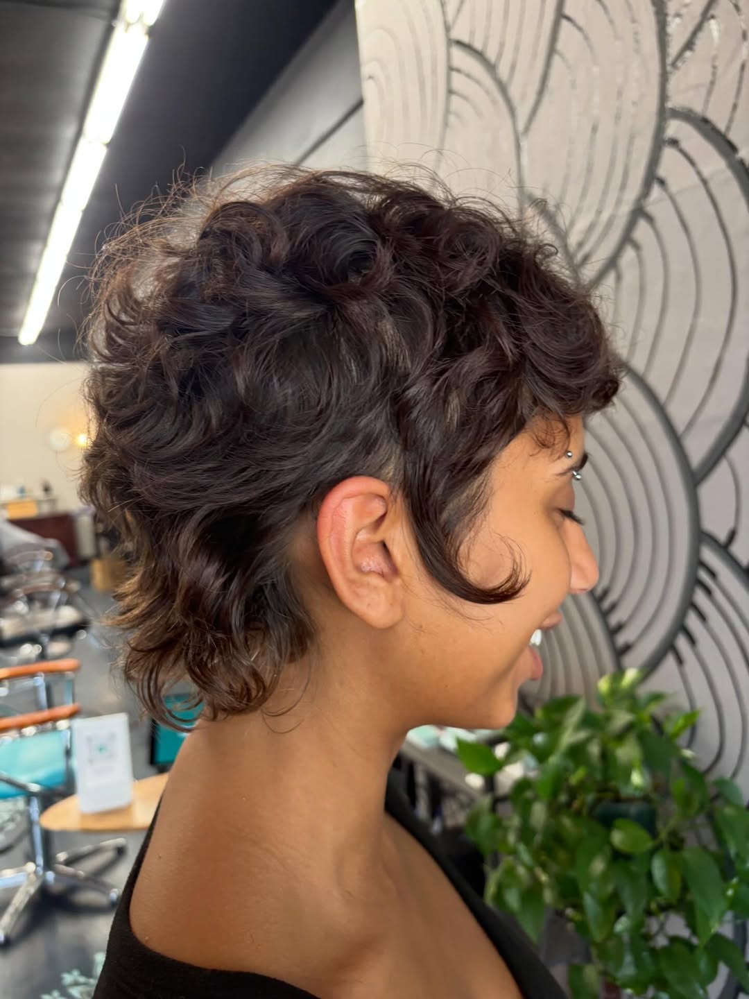 Playful Pixie Shag With Curly Undercut