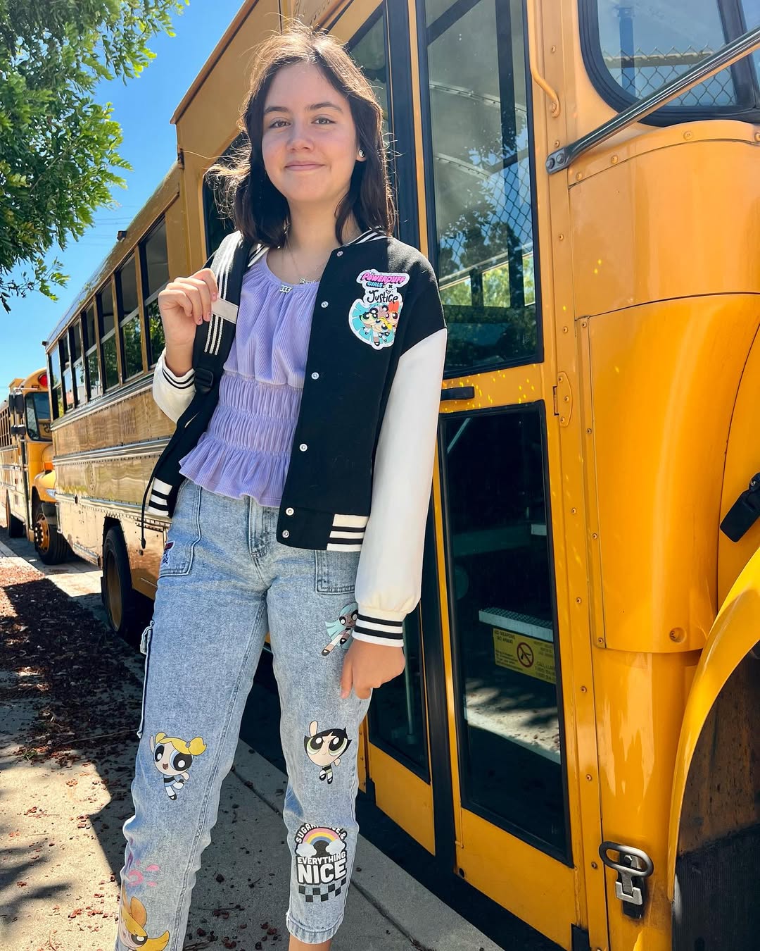 25 Epic School Outfit Ideas for 2026 You Need Now 13 Powerpuff Girls Varsity Jacket And Cartoon Jeans Outfit