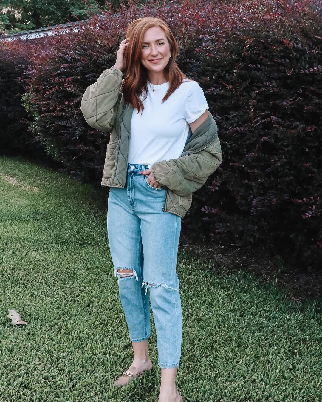 25 Early Fall Outfits You Need for 2026 22 Quilted Bomber Jacket With Ripped Jeans and Mules