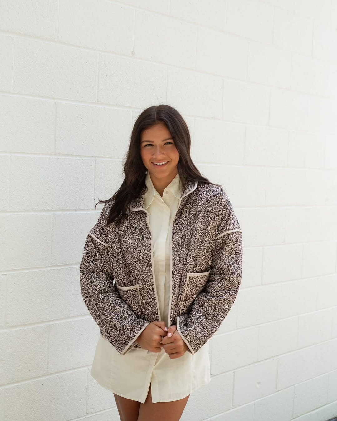 25 Fall Transition Outfits You Need for 2026 13 Quilted Floral Jacket Over Cream Shirt Dress